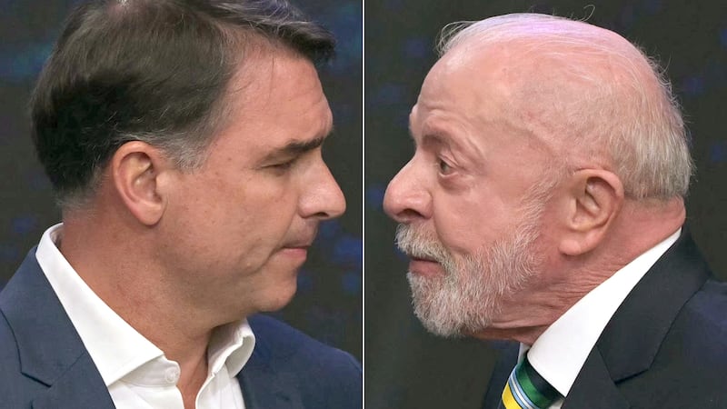 Los candidatos presidenciales, Luiz Inacio Lula da Silva (d) y Flávio Bolsonaro (i). Se verán de nuevo esta noche en el segundo y último debate presidencial, de cara a las elecciones del domingo 25.