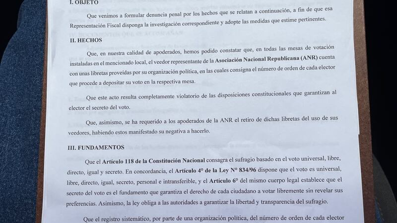 Escrito de denuncia penal por presunta violación de la ley electoral por parte de veedores de la ANR, en la Universidad Católica de Encarnación.