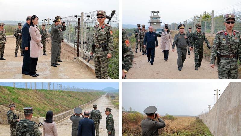 El líder norcoreano Kim Jong junto a una comitiva inspecciona la frontera de su país junto a su hermana, Kim Yo Jong (de traje rosado).
