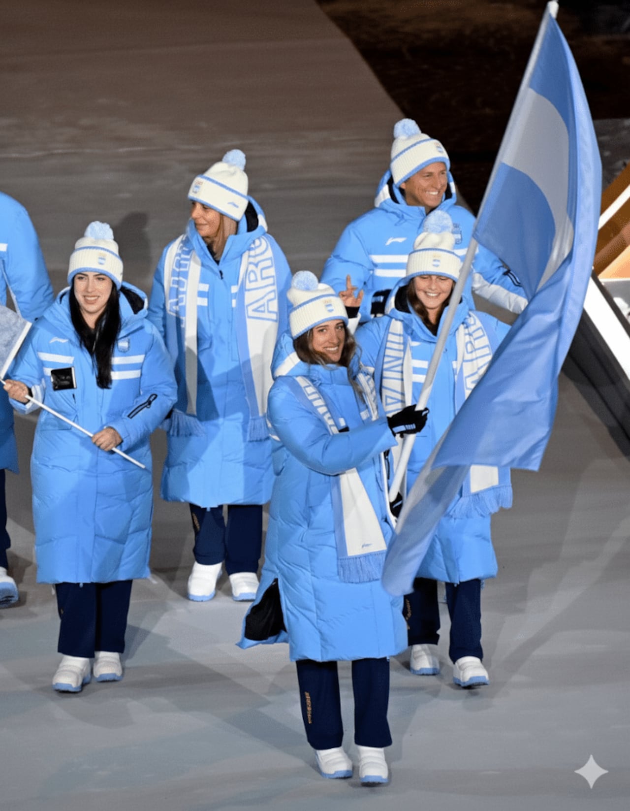 Deportistas argentinos mostrando los colores de su bandera.