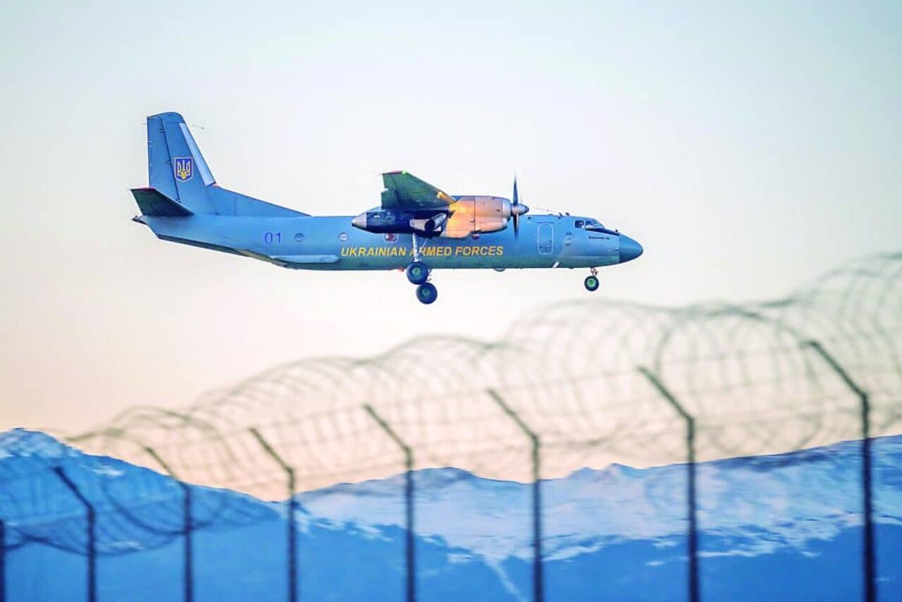 An Antonov An-26 Ukrainian military plane registration "01Blue" flying from Lviv is seen landing at Geneva airport on November 22, 2025 ahead of a meeting between Ukrainian and US officials. Ukrainian and US officials will soon meet in Switzerland to discuss Washington's plan for ending the war with Russia, as it seeks to fix the draft that heeds to some of Moscow's hardline demands.